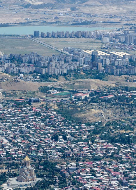 Cityscape with landmark cathedral representing regional community